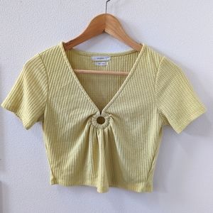 Reserved medium yellow crop top